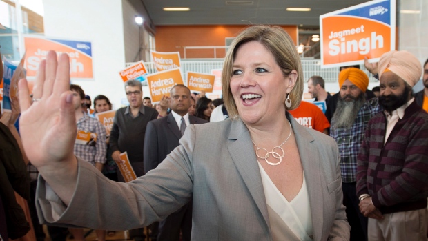 Ontario NDP Leader Andrea Horwath waves to supporters during a campaign stop in Brampton, Ont. on Saturday, May 10, 2014.