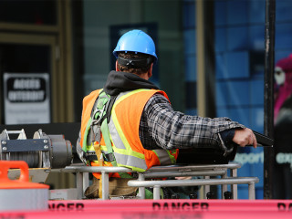 construction worker at a dangerous job site
